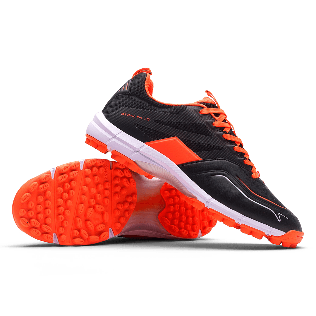 Grays | Grays Stealth 1.0 Black/Orange Jr (2025) | Stealth 1.0 Black/Orange Jr (2025) - EUR 35 | UK 2 | Total Hockey